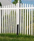 Installed Two Pack Heavy Duty Metal Fence Post Repair Kit With Ground Spike Anchors for tilted or broken posts in a white picket fence
