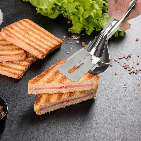 Using Multifunction 11 Inch Premium Stainless Steel Tongs 3 In 1 Gripper Flip And Scraper For Grilling to serve a sandwich