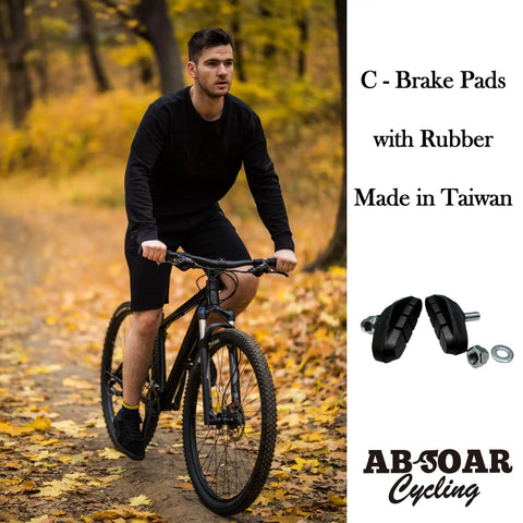 Cyclist on forest path with Beefed Up C Brake Pads For Road Bike BMX City Bicycle Replacement Shoes 48mm Pair beside image