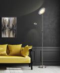 70 Inch Modern Slim LED Torchiere Floor Lamp With Reading Light And Remote In Antique Brass Finish next to yellow sofa in living room