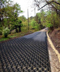 Installed Heavy Duty Gravel Stabilizer Geogrid With Drainage Holes For Driveway And Garden 3x7m Floor Grate Grid on sloped road.