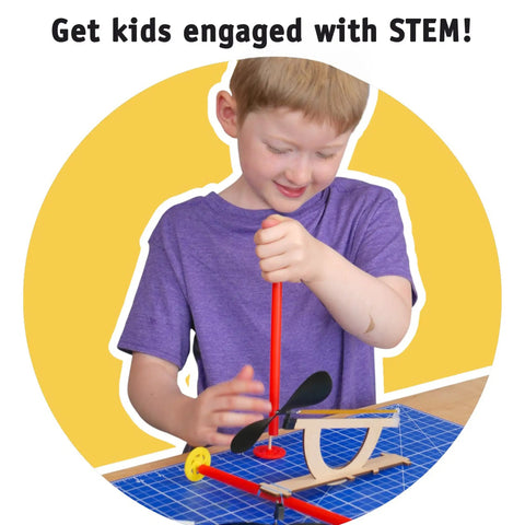Child assembling Hands On Rubber Band Propeller Car Kit 10 Pack For STEM Projects Kids 8 And Up Learn Energy To Motion in classroom.