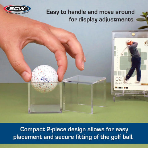Person placing golf ball into clear golf ball display case for collectors two piece compact polystyrene shell design holds six balls