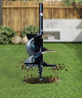 Beefy 18 Inch Earth Auger Drill Bit Set For Tractor Mounts in action, 2 Inch Round Drive, digging into the grass-filled ground