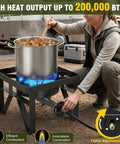 200000 BTU Heavy Duty Propane Burner Boss Level Heat Outdoor Stove with pot cooking, adjustable regulator, and hose in use