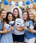 Women holding Last Sail Before The Veil Photo Booth Props Kit 24 Nautical Bachelorette Party Decorations with smiles and props