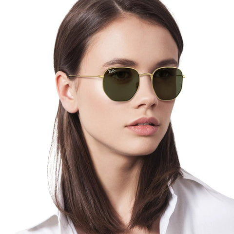 Model wearing Unisex Hexagonal Flat Lens Sunglasses With Lightweight Gold Metal Frame And G Fifteen Green Lenses 54 mm Medium Fit