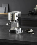 Semi Automatic Espresso Coffee Maker With Built In Steam Wand And High Pressure Pump For Rich Creamy Shots on dark kitchen countertop.