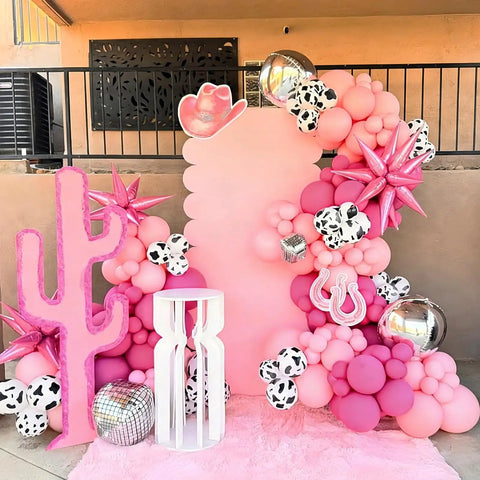 Colorful display of Pink Cow Print Balloons Party Kit 67 Piece Set For Birthday Baby Shower Rodeo Farm Party Decorations Includes 12 Inch Cowgirl Balloons In Hot Pink Pink Light Pink Cow Print Confetti Balloons And Pink Ribbon.