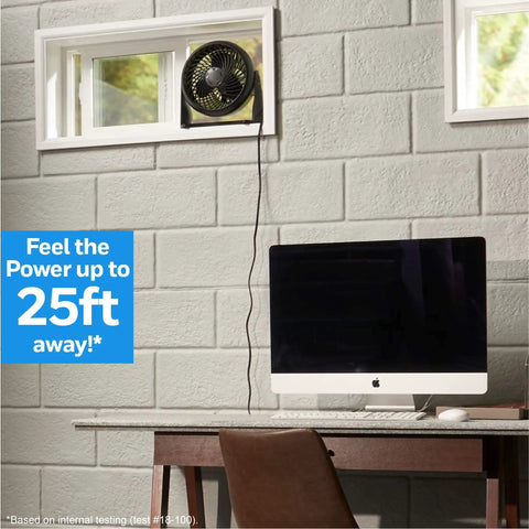 TurboForce Air Circulator Table Fan With 3 Speeds And 90 Degree Pivot on a windowsill near a desk setup.