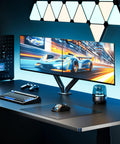 Built Tough Heavy Duty Dual Monitor Arm Stand With Full Motion Adjustment Fits 17 To 32 Inch Screens Supports 20 Lbs Per Arm Zero Sagging Steel Frame on a sleek desk setup with gaming monitors.