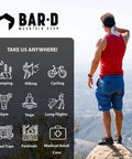 Man using biodegradable body wipes with tea tree oil and aloe vera on mountain, ideal for hiking and post-workout