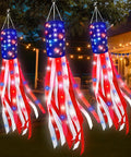 Three Pack 60 Inch American Flag Windsocks With Red White Blue LED Lights For Outdoor Yard Decor Show Off Fourth Of July And 250th Anniversary Patriotic USA Heavy Duty Memorial Day against house backdrop