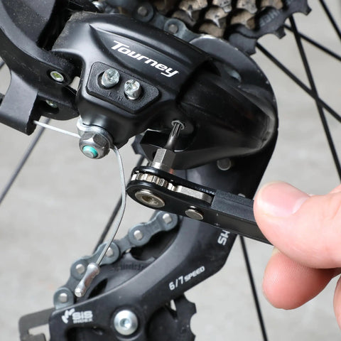 Using Top Shelf Mini Ratchet Set, 34 Piece Cr-V Steel Kit, to adjust bicycle derailleur in tight space.