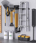 Garage Tool Organizer Wall Mount Kit With Broom Holder And Shovel Hanger Heavy Duty Shelving Rack With Hanging Hooks installed on wall