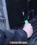 Person securing cargo with Green 6 Foot Padded Ratchet Straps 1 Inch Wide 2 Pack, 1500 Pound Break Strength, 500 Pound Safe Working Load.