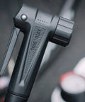 Close-up of the AutoHead on Bike Floor Pump With Industrial Gauge, Durable Aluminum Barrel Up To 160 Psi, 9 Inch Steel Base.