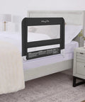 Mesh Bed Guard Rail For Toddlers Aged 2 To 5 Years fits twin to king beds, black color, attached to a bed in a bedroom setting.