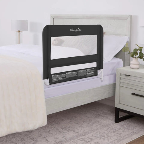 Mesh Bed Guard Rail For Toddlers Aged 2 To 5 Years fits twin to king beds, black color, attached to a bed in a bedroom setting.