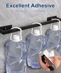 Stick On Stainless Steel Towel Bar 24 Inch Matte Black No Drill Wall Shelf Rack Hang On Towel Holder demonstrating strong adhesive with water containers hanging
