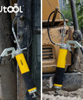 Heavy Duty 8000 PSI Pistol Grip Grease Gun Kit with 14 Oz capacity and 18 Inch Resin Flex Hose shown on machinery outdoors