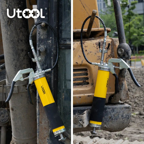 Heavy Duty 8000 PSI Pistol Grip Grease Gun Kit with 14 Oz capacity and 18 Inch Resin Flex Hose shown on machinery outdoors