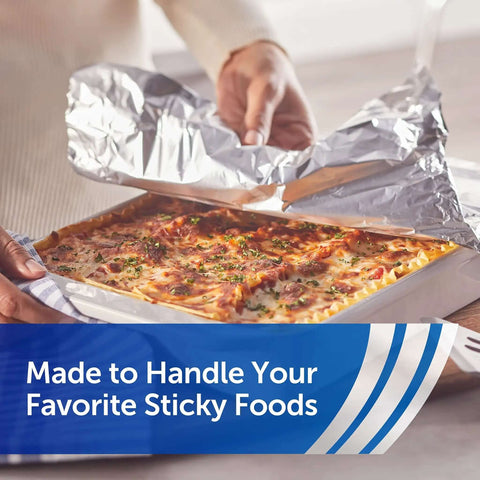 Person using Nonstick Aluminum Foil Roll For Easy Cooking And Mess Free Cleanup Perfect For Covering Casseroles Foil Packet Meals Roasts And Leftovers 130 Sq Ft 12 Inch Wide Heavy Duty Kitchen Saver to cover casserole dish