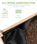Close-up view of raised garden bed on a sturdy wood stand with drainage and bed liner, soil visible, natural finish