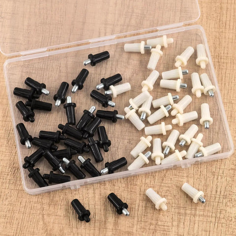 60 Piece 4 Sizes Spring Loaded Cabinet Door Repair Pins Set in black and white for shutters and doors in open box on wood surface