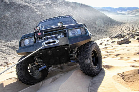 Off-road vehicle with Hawse Style Winch Fairlead Polished Aluminum For Synthetic Rope Reduces Rope Fraying And Aids Angled Pulls