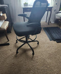 No Slip Bell Glides For Office Chairs And Stools Replacement High Profile Stationary Castor Wheels With Stick On Felt Pads Super Smooth Roll On Carpet Floors Pack Of Five Pieces on a black office chair.