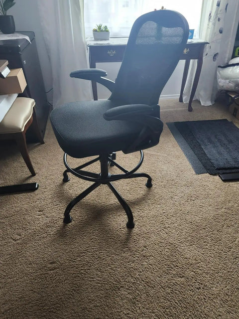No Slip Bell Glides For Office Chairs And Stools Replacement High Profile Stationary Castor Wheels With Stick On Felt Pads Super Smooth Roll On Carpet Floors Pack Of Five Pieces on a black office chair.