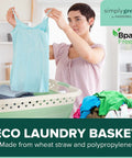Eco Friendly Wheat Straw Collapsible Storage Bin For Home Organization Big 25 Inch Laundry Hamper With woman folding clothes