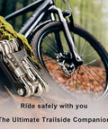 All In One Bike Multitool Kit With Chain Breaker And Tire Repair, beside bike on forest trail, compact stainless steel tool