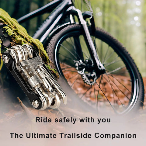 All In One Bike Multitool Kit With Chain Breaker And Tire Repair, beside bike on forest trail, compact stainless steel tool