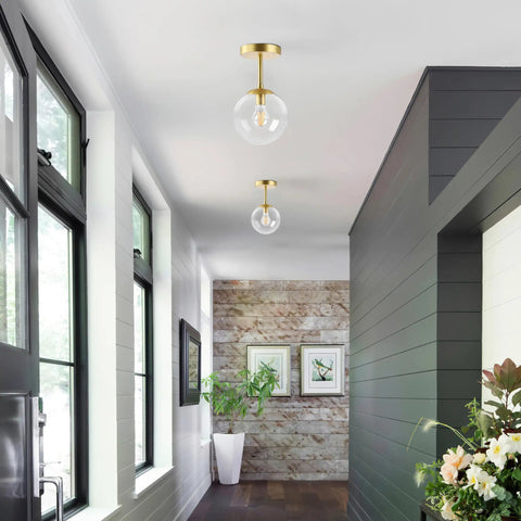 Dope Mid Century Modern Globe Semi Flush Mount Ceiling Light With Clear Glass And Gold Brass Finish in hallway