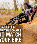 Mountain biker turning on trail with Grapple Mountain Bike Handlebar Grips With Lock On Ring For MTB And BMX. Text overlay: Available in multiple colors to match your bike.