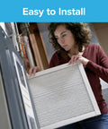 Person installing 14X24X1 AC Furnace Air Filter MERV 13 MPR 2200 Elite Allergen Bacteria Virus Filter 6 Pack Pleated One Inch Electrostatic
