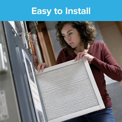 Person installing 14X24X1 AC Furnace Air Filter MERV 13 MPR 2200 Elite Allergen Bacteria Virus Filter 6 Pack Pleated One Inch Electrostatic