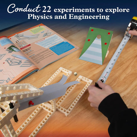 Hands measuring bridge model from Kids Mechanical Engineering Kit Build 20 Mechanical Models And Vehicles Learn Force And Motion