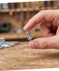 Beefy Heavy Duty Metal Expansion Bolt Kit 35 Piece Petal Nut Fasteners For Hollow Wall And Plasterboard M4 M5 M6 Secure Fastening For Home Repairs DIY Projects And Installations, metal expansion bolt held by hand