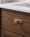 Killer Style Beaded Zinc Alloy Cabinet Knobs With Backplate Antique Brass 6 Pack For Kitchen Cabinets And Drawer Upgrades close up on bathroom drawer.