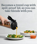 Pouring dressing from Personal Cup Adapter Kit For Full Size Blenders, BPA Free And Dishwasher Safe, into salad bowl