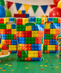 Pack Of Thirty Building Block Favor Bags With Reinforced Handles For Kids Treats And Candy Hella Festive Party Goodies Stash Solid birthday supplies with colorful design.