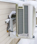 Outdoor AC unit with snow, showcasing use for Five Pack Three Quarters Inch ID Foam Pipe Insulation Tubes Sixteen Point Nine Inch Length Grey