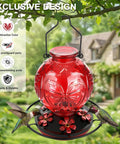 Outdoor Hummingbird Feeder 25 Oz With Perch And Five Flower Ports No Spill Nectar Feeder For Garden Decor Attracting Birds A Sweet Gift For Women Red in garden setting.