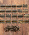 Mini Butterfly Door Hinge Set Antique Bronze 20 By 25mm 20 Pieces with screws on wooden surface