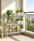 Three-Tier Heavy-Duty Chrome Wire Shelving Rack With Adjustable Shelves Space-Saving Storage Unit Holds Up To 250 Lbs Per Shelf 750 Lbs Total Rust-Resistant Waterproof Easy Assembly For Garage Kitchen Laundry on balcony with potted plants