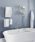 Latitude II 24-Inch Wall Mounted Towel Bar In Chrome For Modern Bathrooms above a bathtub with towels