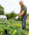 Man using Heavy Duty Garden Hoe With Adjustable Long Handle From 30 To 72 Inches, Sharp Edge Triangle Weeding Hoe in garden bed.